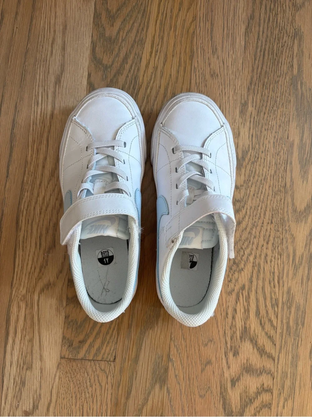 Nike Kids White Sneakers with Light Blue Swoosh